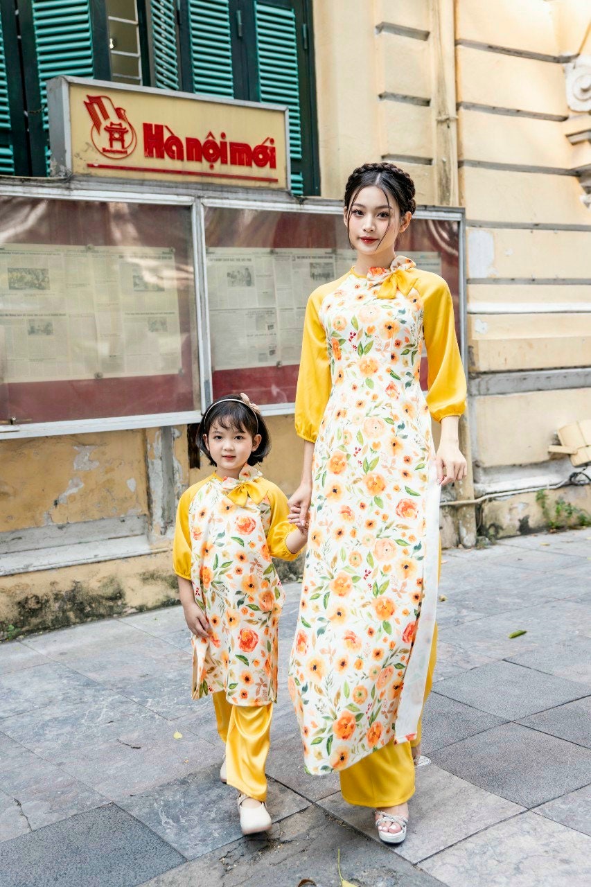 Mom and Daughter Yellow Bow Matching Ao Dai Set