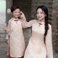 Linh Vy - Mom and Daughter Haze Cream Teardrop Cutout Red Knot Ao Dai Set