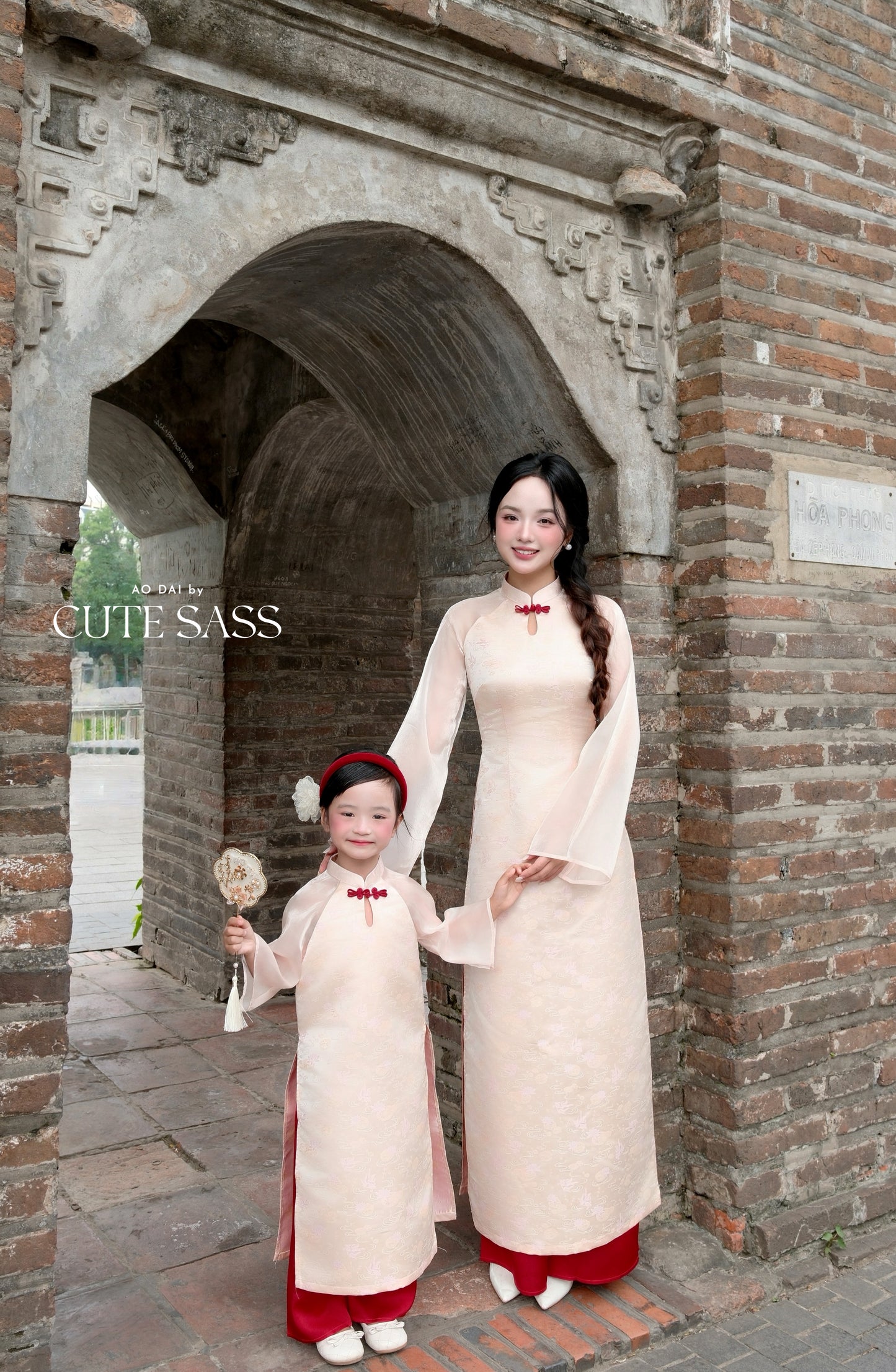 Linh Vy - Mom and Daughter Haze Cream Teardrop Cutout Red Knot Ao Dai Set