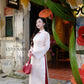 Linh Vy - Haze Cream Teardrop Cutout Red Knot Ao Dai Set