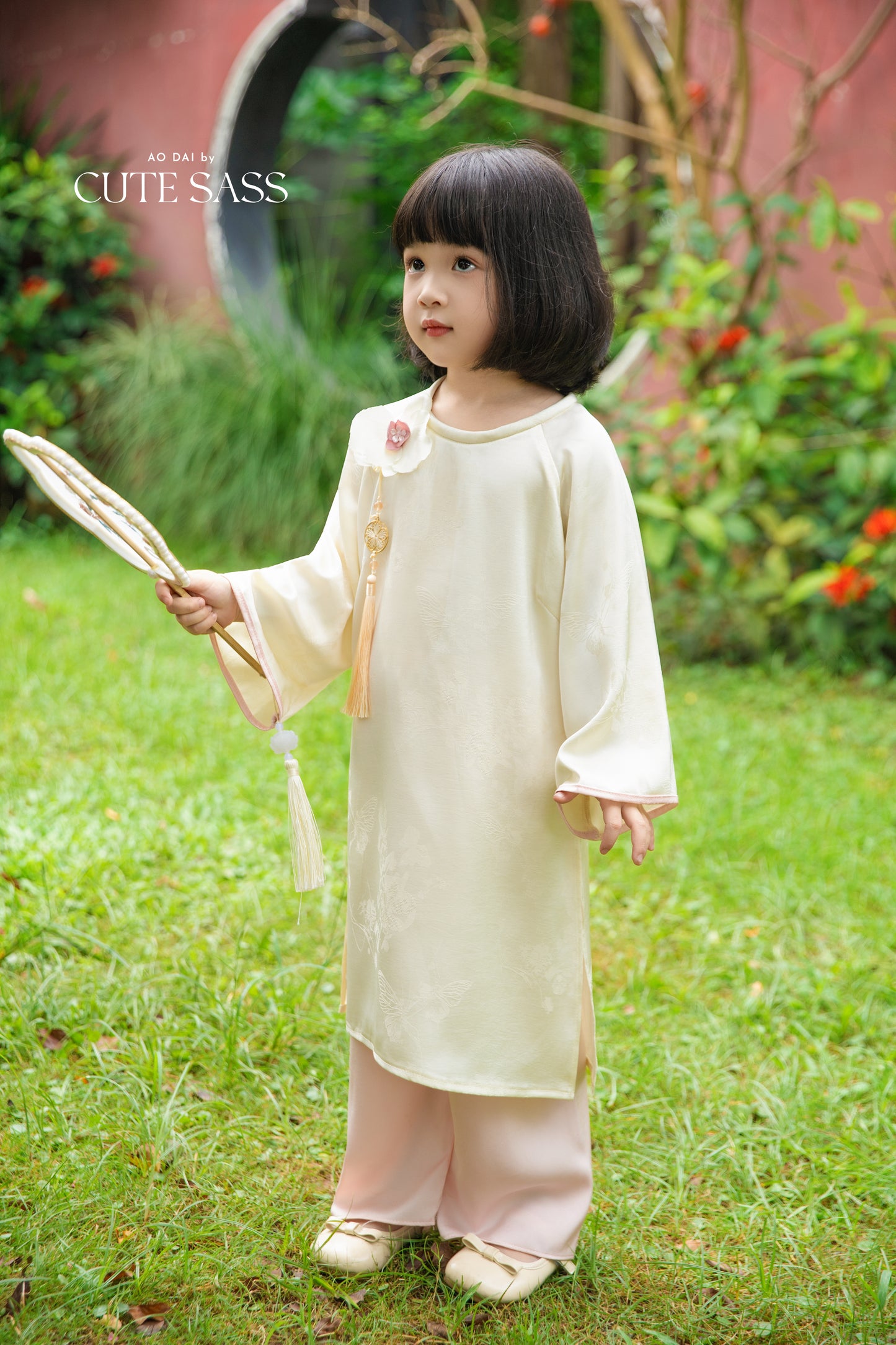 Gia Hòa - Mom and Daughter Cream with Hibiscus Flower Pin Ao Dai Set