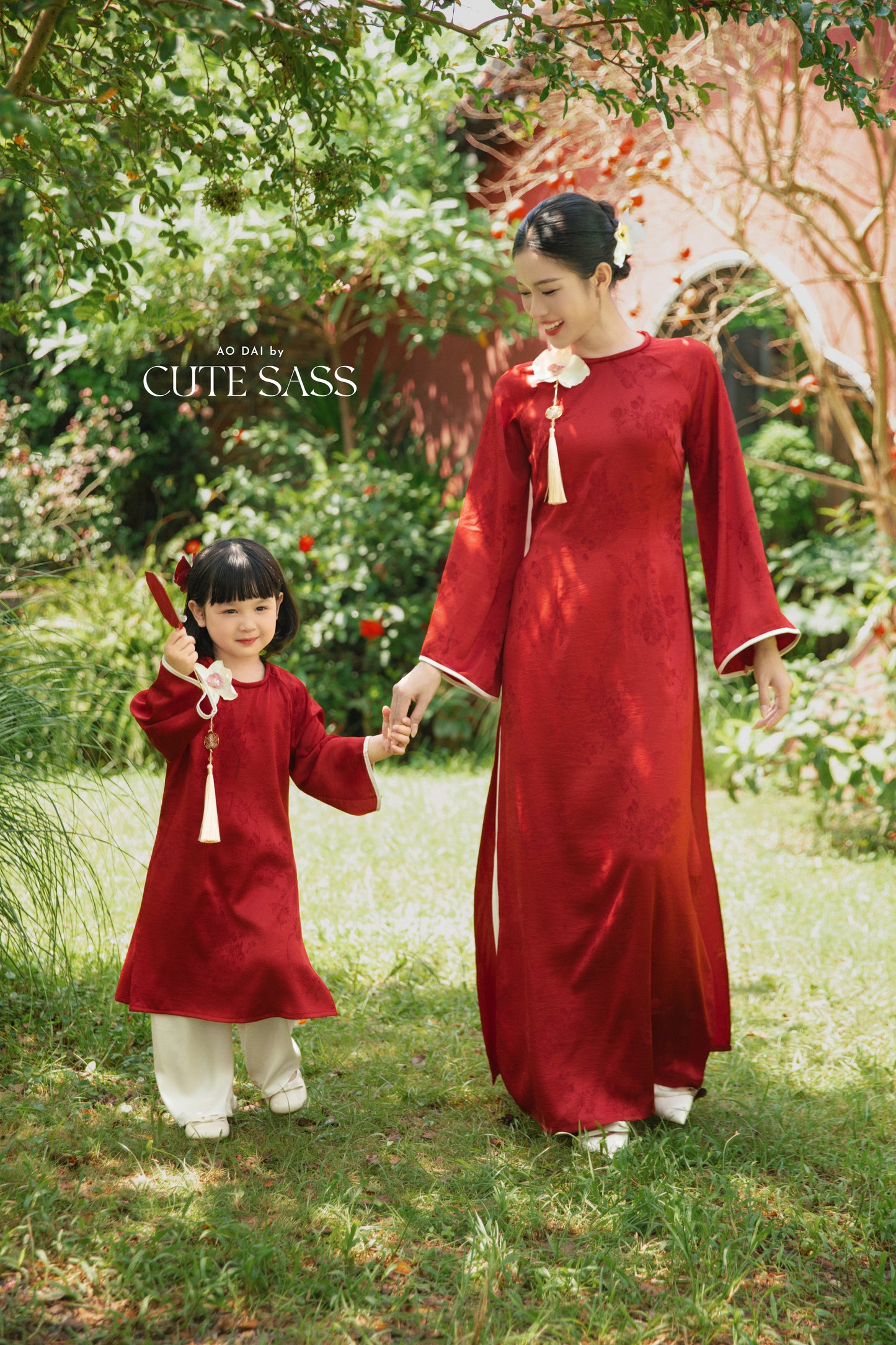 Gia Hòa - Mom and Daughter Red with Hibiscus Flower Pin Ao Dai Set
