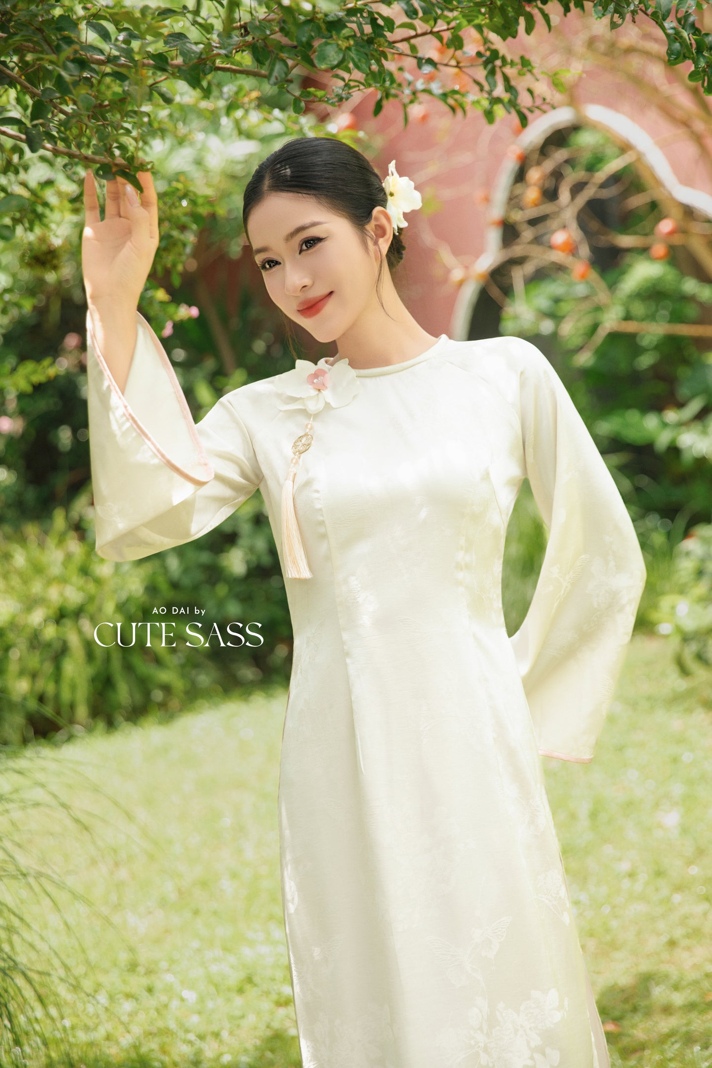 Gia Hòa - Mom and Daughter Cream with Hibiscus Flower Pin Ao Dai Set
