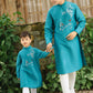 Gia Hòa - Men and Boy Turquoise Robin Bird Ao Dai Set