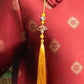 Ao Dai Pin, Tassels