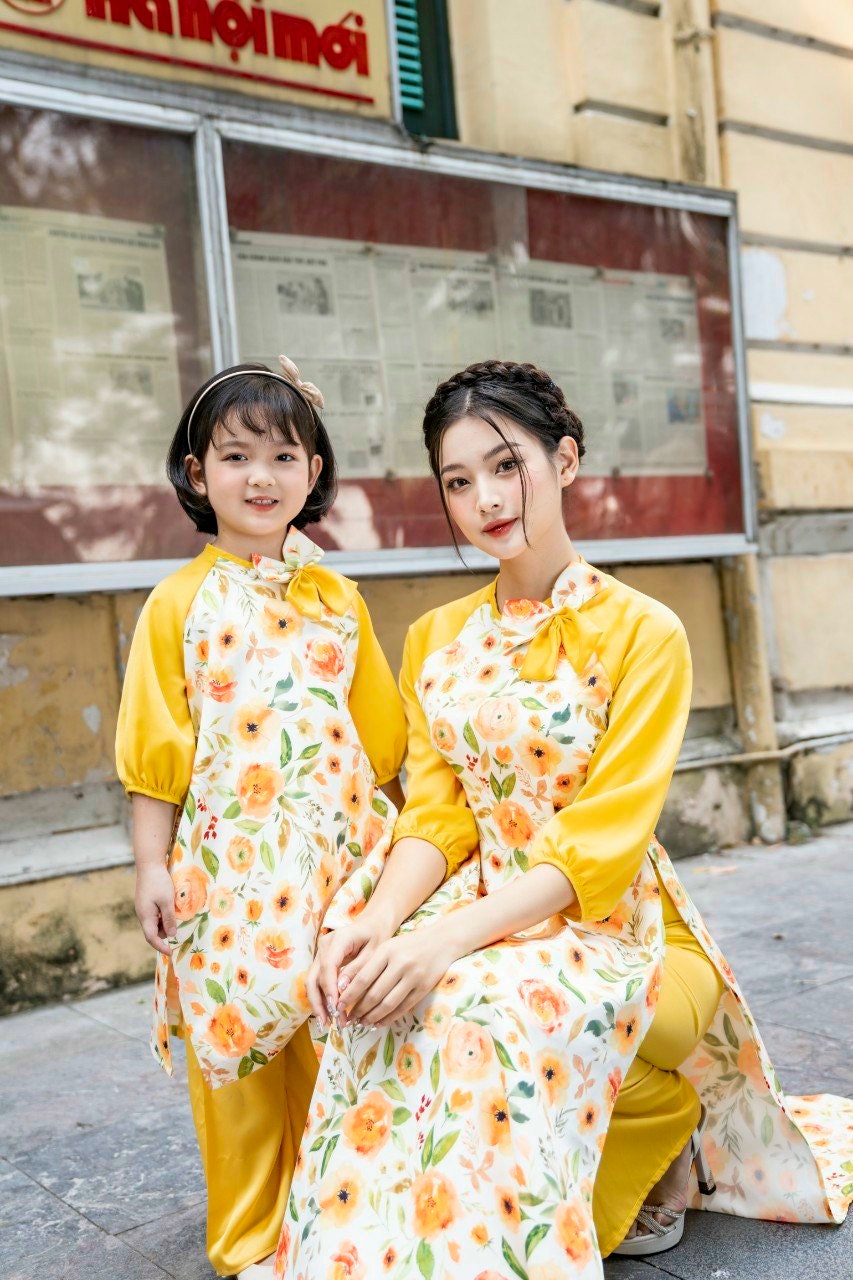 Mom and Daughter Yellow Bow Matching Ao Dai Set