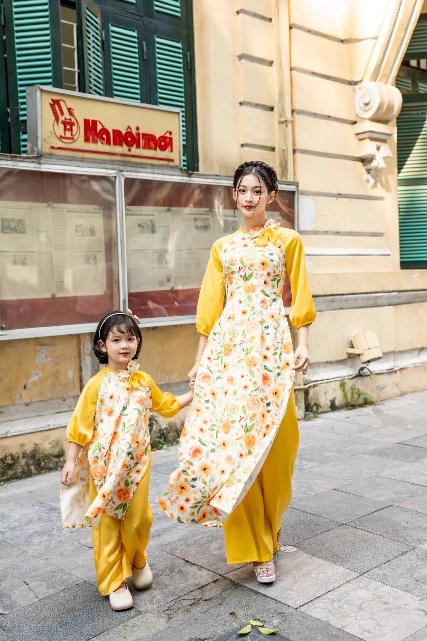 Mom and Daughter Yellow Bow Matching Ao Dai Set